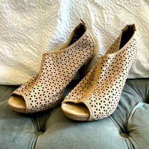 Woman’s peep toe ankle heel